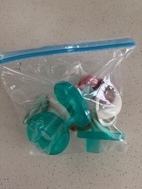 Assorted Teal and White Pacifier
